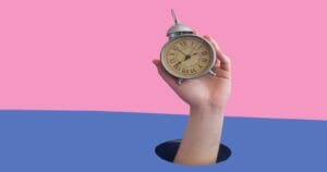 Clock in hand showing how long it takes to get lottery winnings